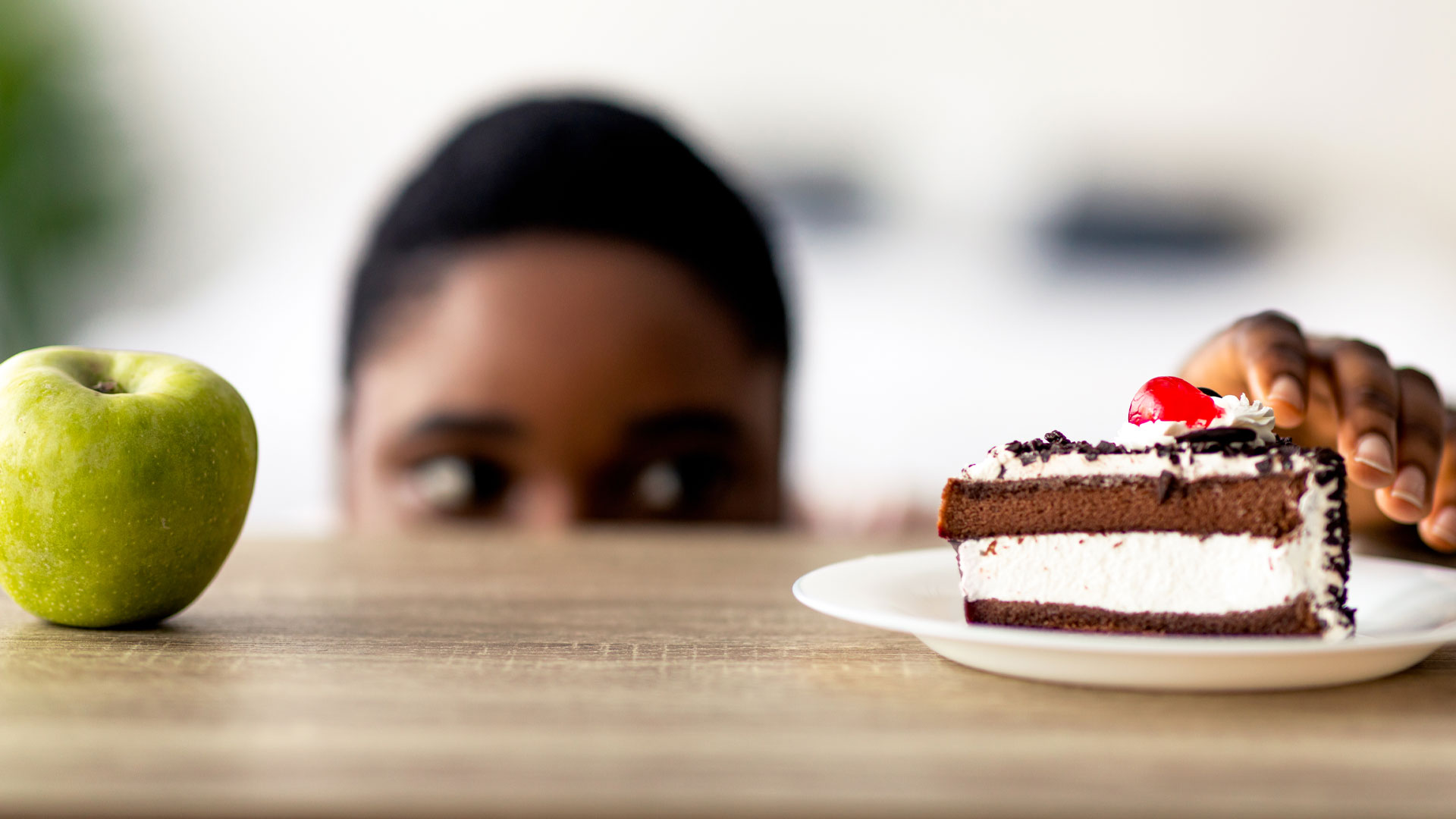 Boy prefers cake to apple